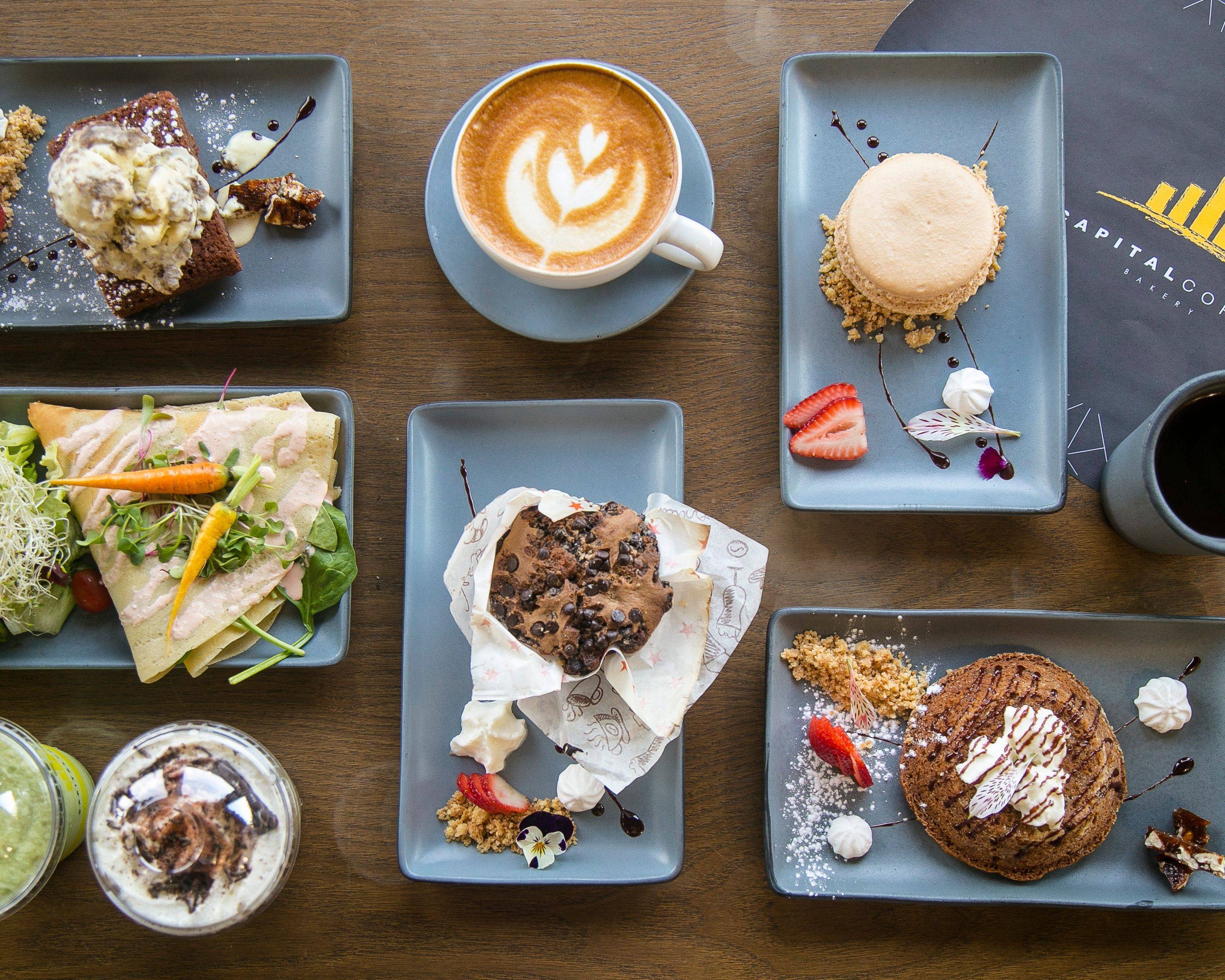 Interior of Capital Coffee in San Luis Potosí showing modern minimalist decor and cozy seating areas